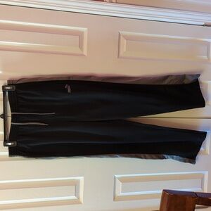 Puma pants, large, black with grey stripe.
